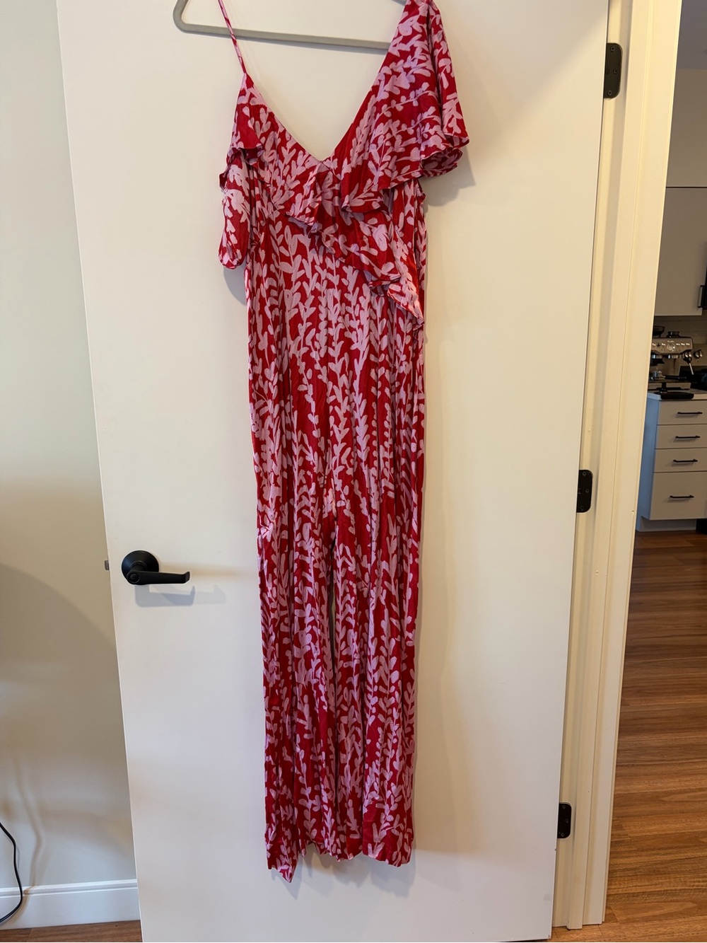 Corey Lynn Calter pink and red jumpsuit.